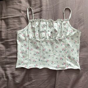 Ruffled crop top with floral designs